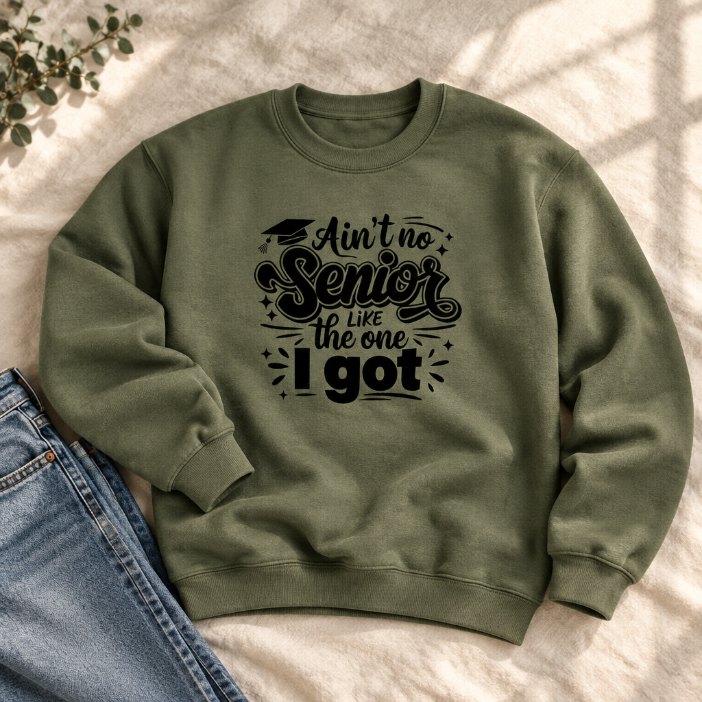Boutique-style mockup of the olive green Senior Squad graduation crewneck with black lettering